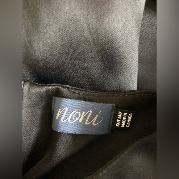 Black satin formal maxi dress with gold buttons and tiered bottom. - Picture 5 of 7